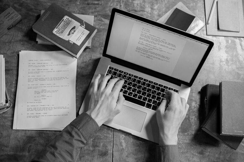 image of man doing copywriting on a laptop