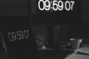 Insights 35 numbers on a computer screen with a clock representing how long to build a website