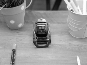 Insights 24 small robot on a desk representing why ai websites don’t rank on google