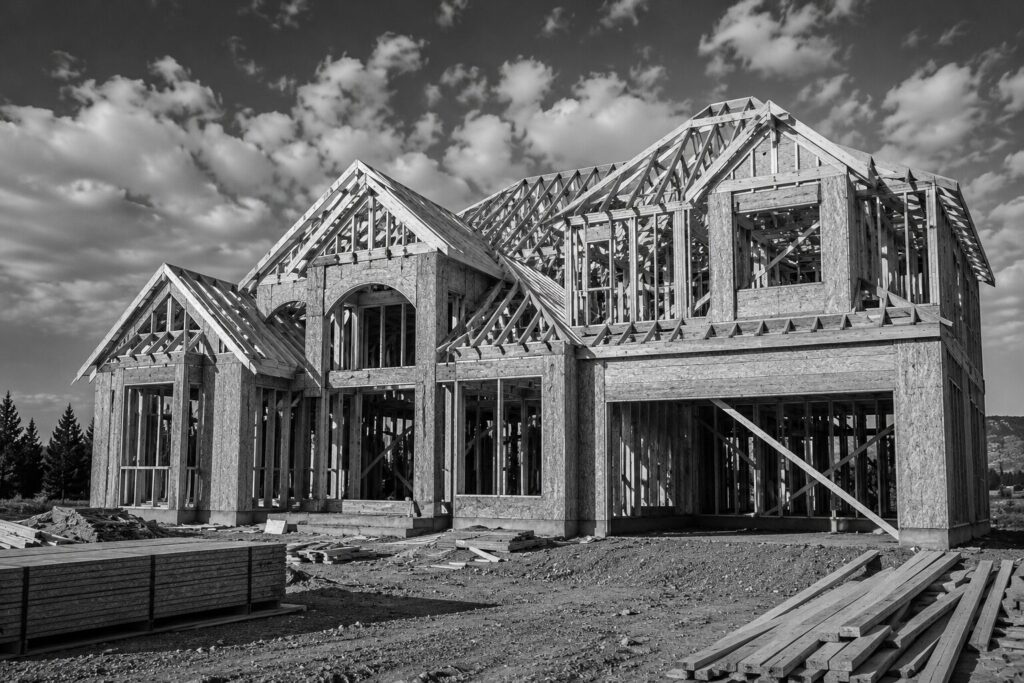 a framed house representing construction company website design